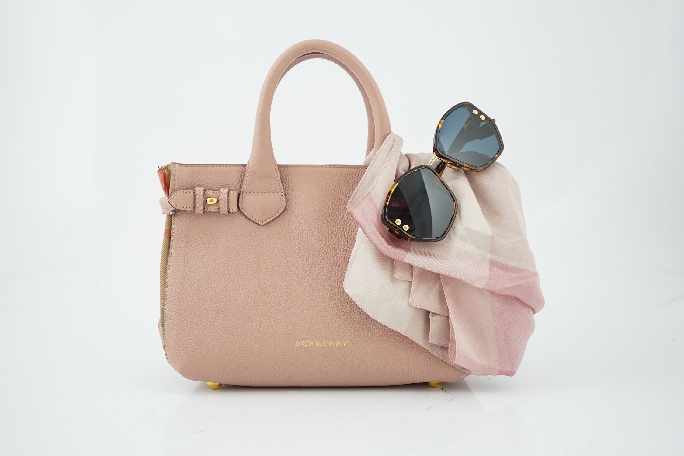 A pink Burberry small banner tote, a pink, white and silver tartan silk scarf and a pair of Dior tortoiseshell sunglasses, Handbag height 21cm, height to handle 32cm, width 28cm, depth 11cm, Scarf 192cm x 63cm